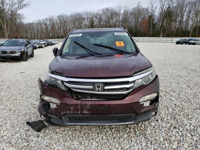 Photo 5 from auction – 2016 HONDA PILOT TOUR with VIN 5FNYF5H93GB014701