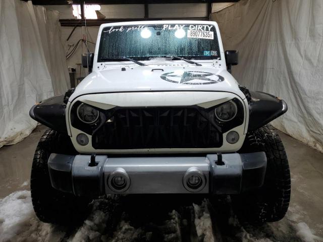Photo 5 from auction – 2015 JEEP WRANGLER U with VIN 1C4BJWDG2FL573022