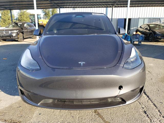 Photo 5 from auction – 2023 TESLA MODEL Y with VIN 7SAYGDEE6PF701344