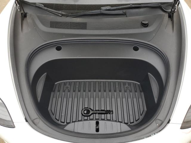 Снимка 11 от търг – 2022 TESLA MODEL 3 с VIN 5YJ3E1EB5NF144165