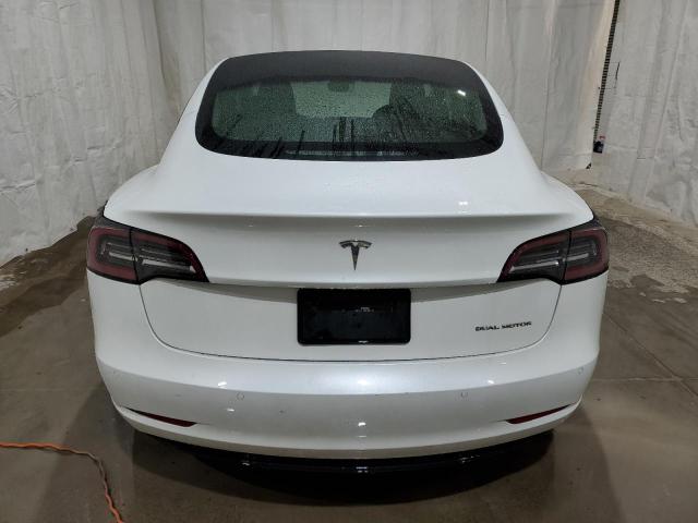 Photo 6 from auction – 2022 TESLA MODEL 3 with VIN 5YJ3E1EB9NF288947