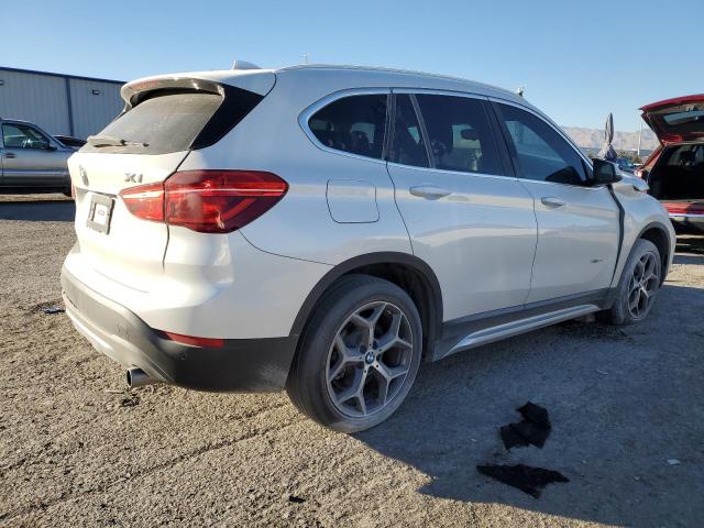 Photo 3 from auction – 2018 BMW X1 XDRIVE2 with VIN WBXHT3C36J5K21286
