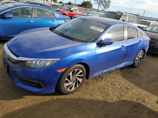 HONDA CIVIC EX 2017 with VIN 2HGFC2F70HH535114 - Photo from auction