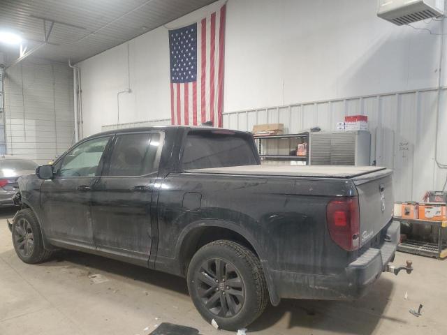 Photo 2 from auction – 2021 HONDA RIDGELINE with VIN 5FPYK3F16MB011985