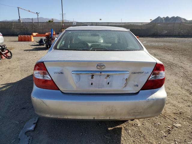 Photo 6 from auction – 2004 TOYOTA CAMRY LE with VIN 4T1BF32K74U574046