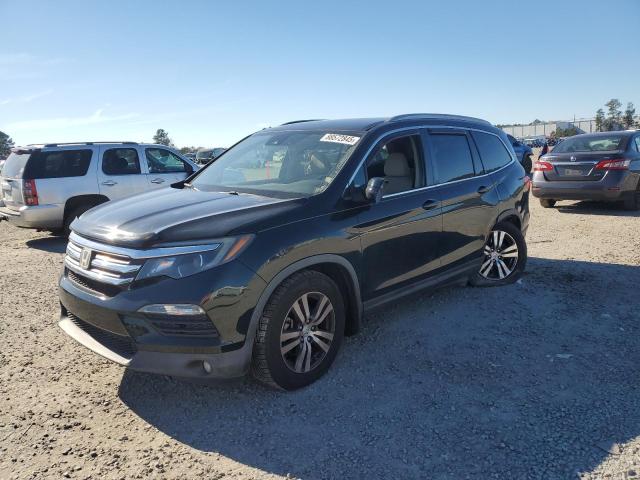HONDA PILOT EX 2016 with VIN 5FNYF5H44GB039658 - Photo from auction