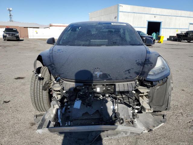 Photo 5 from auction – 2018 TESLA MODEL 3 with VIN 5YJ3E1EA0JF011928