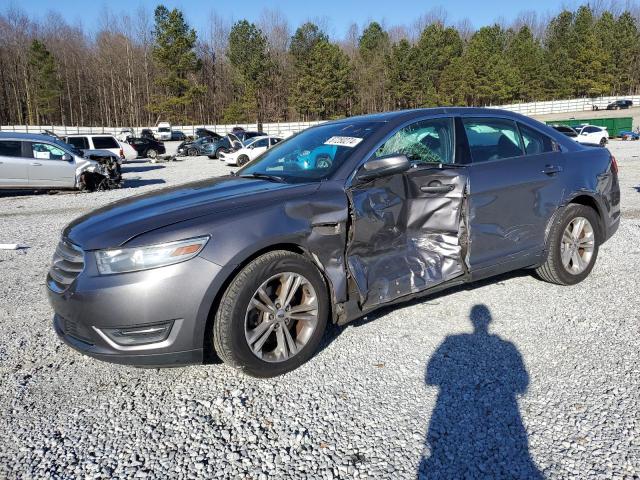 FORD TAURUS SEL 2014 with VIN 1FAHP2E80EG132799 - Photo from auction