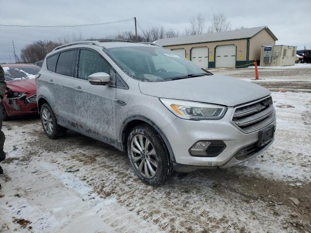Photo 4 from auction – 2017 FORD ESCAPE TIT with VIN 1FMCU0J95HUA77090