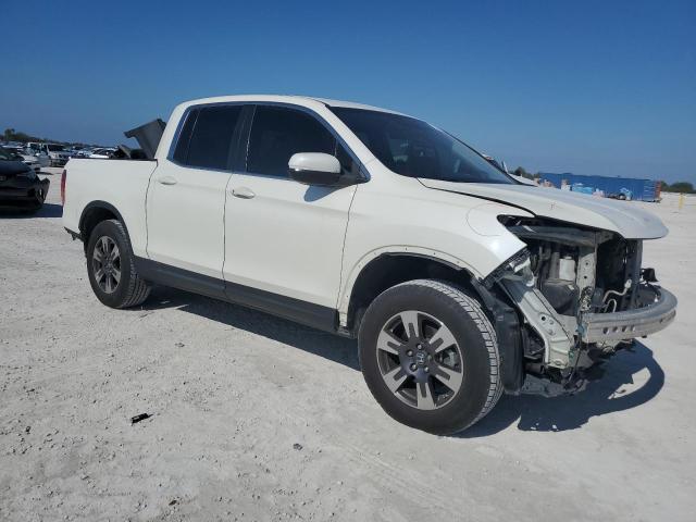 Photo 4 from auction – 2019 HONDA RIDGELINE with VIN 5FPYK2F55KB000258