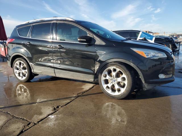 Foto 4 de la subasta – 2014 FORD ESCAPE TIT con VIN 1FMCU0J90EUE56896