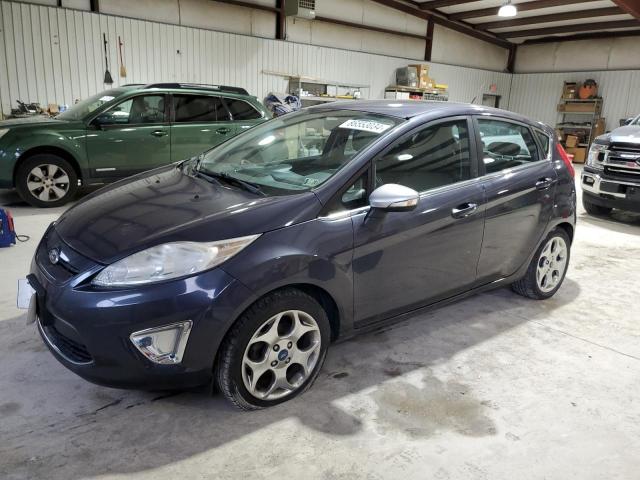 FORD FIESTA TIT 2013 with VIN 3FADP4FJ5DM173381 - Photo from auction