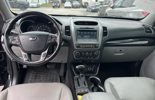 Photo 9 from auction – 2015 KIA SORENTO SX with VIN 5XYKWDA73FG615624