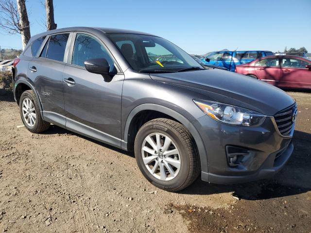 Photo 4 from auction – 2016 MAZDA CX-5 TOURI with VIN JM3KE2CY0G0847397