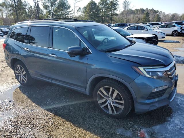 Photo 4 from auction – 2017 HONDA PILOT TOUR with VIN 5FNYF6H96HB041320