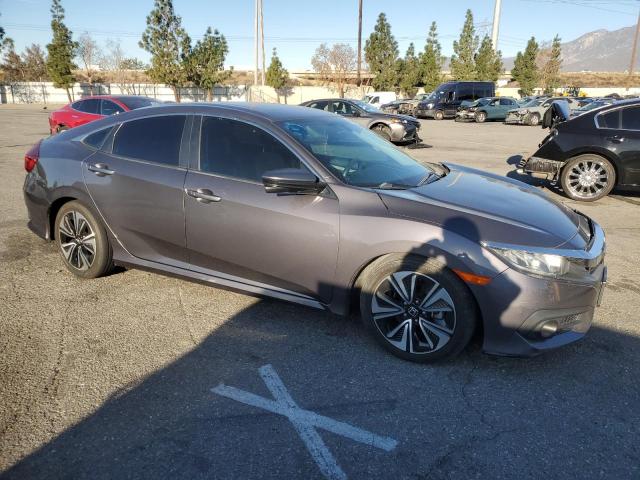 Photo 4 from auction – 2016 HONDA CIVIC EX with VIN 2HGFC1F35GH645162