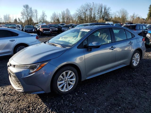 TOYOTA COROLLA LE 2023 with VIN JTDB4MEE4PJ004386 - Photo from auction