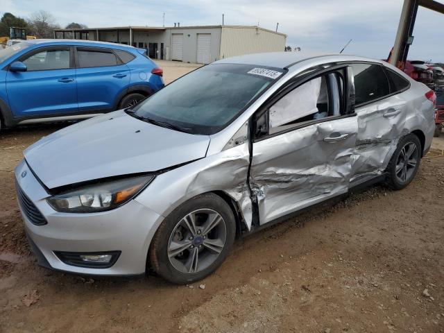 FORD FOCUS SE 2018 with VIN 1FADP3F20JL307357 - Photo from auction