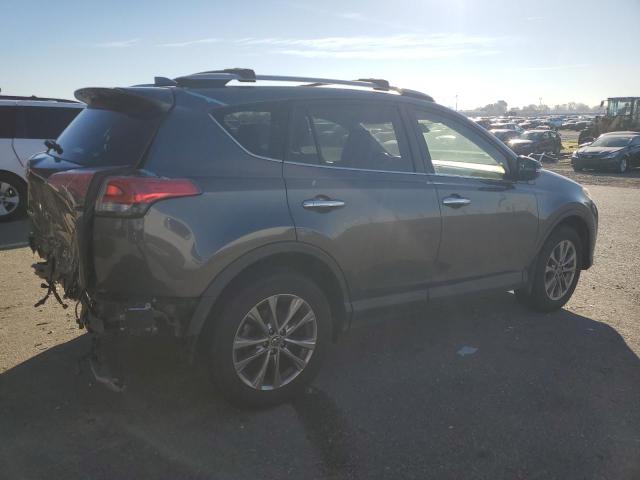 Photo 3 from auction – 2017 TOYOTA RAV4 LIMIT with VIN JTMYFREV8HD107909