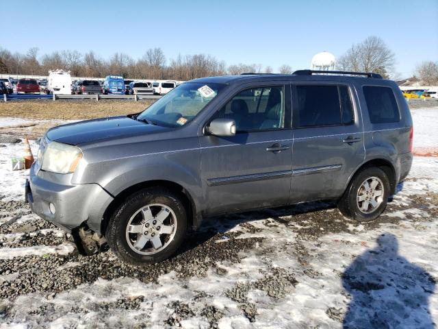 HONDA PILOT TOUR 2009 with VIN 5FNYF48889B011622 - Photo from auction
