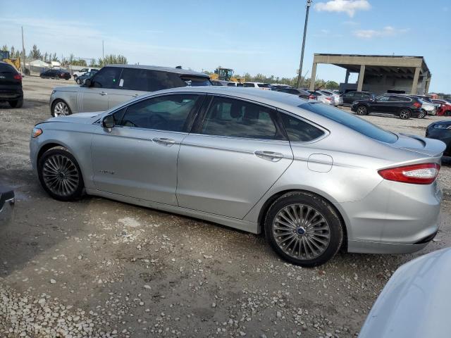 Photo 2 from auction – 2014 FORD FUSION TIT with VIN 3FA6P0RU2ER262546