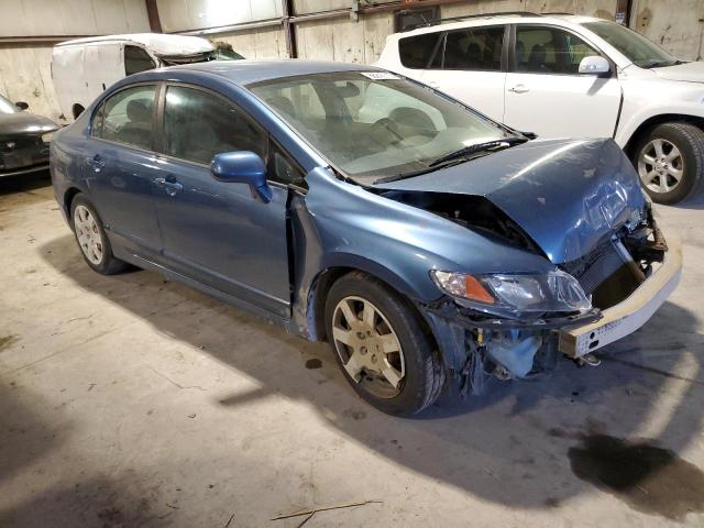 Photo 4 from auction – 2011 HONDA CIVIC LX with VIN 19XFA1F53BE037134