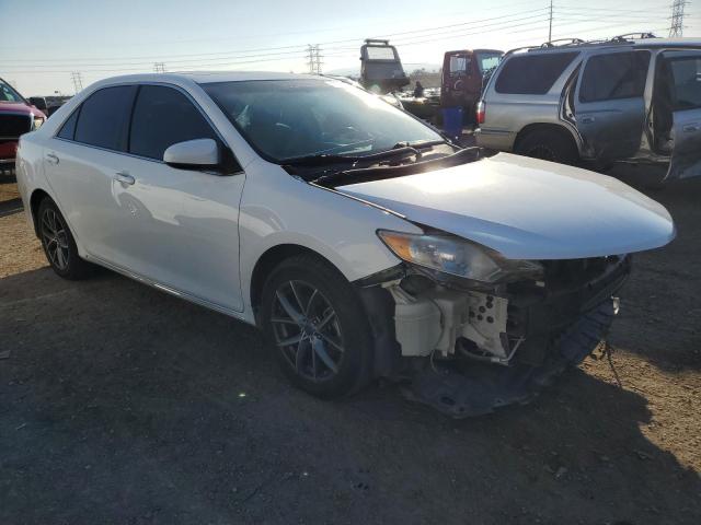 Photo 4 from auction – 2014 TOYOTA CAMRY L with VIN 4T4BF1FK9ER387509
