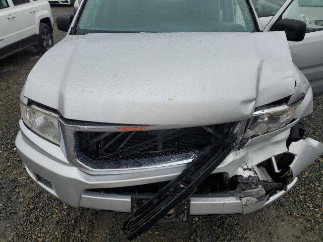 Photo 11 from auction – 2009 HONDA RIDGELINE with VIN 5FPYK16239B103205