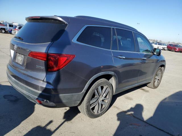 Photo 3 from auction – 2016 HONDA PILOT TOUR with VIN 5FNYF5H91GB022473