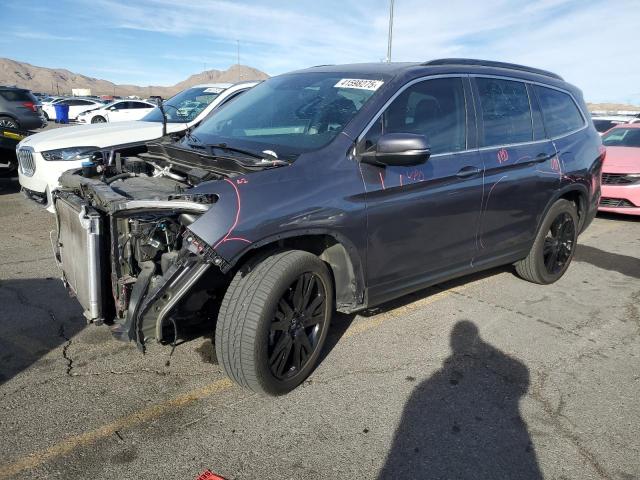 HONDA PILOT SE 2022 with VIN 5FNYF6H28NB054357 - Photo from auction