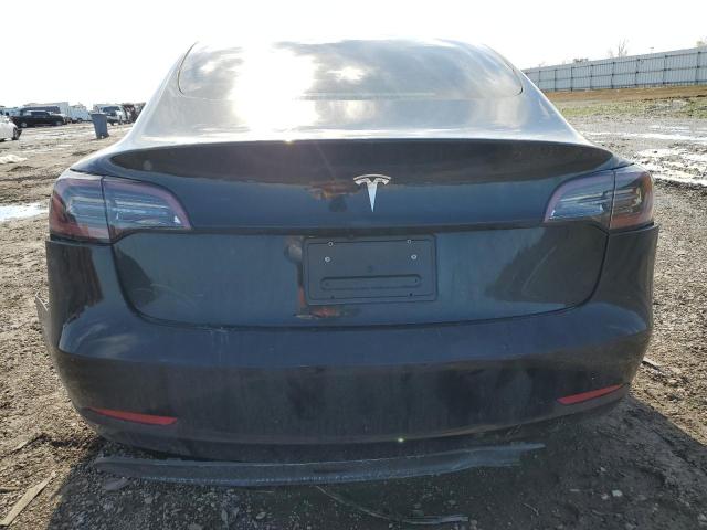 Снимка 6 от търг – 2023 TESLA MODEL 3 с VIN 5YJ3E1EA3PF569331