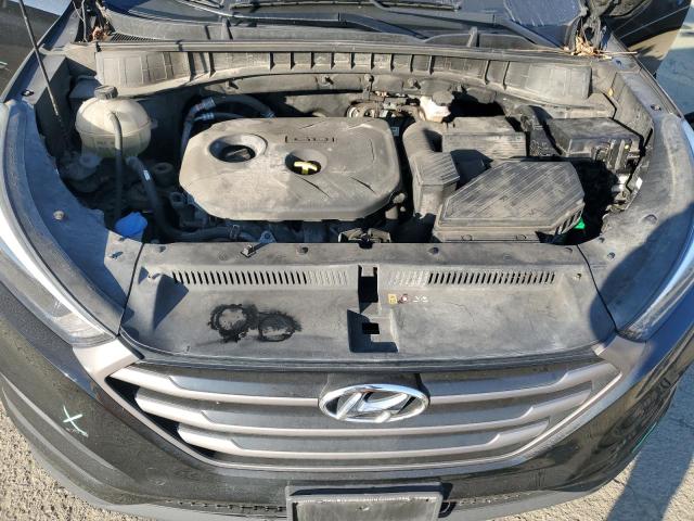 Photo 12 from auction – 2016 HYUNDAI TUCSON SE with VIN KM8J23A47GU074872