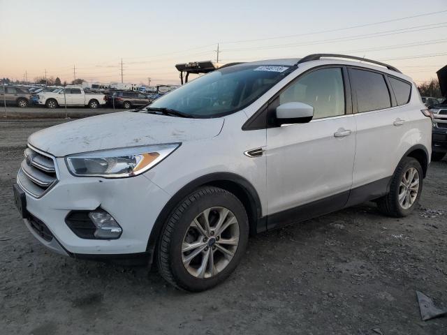 FORD ESCAPE SE 2018 with VIN 1FMCU9GD0JUA57402 - Photo from auction