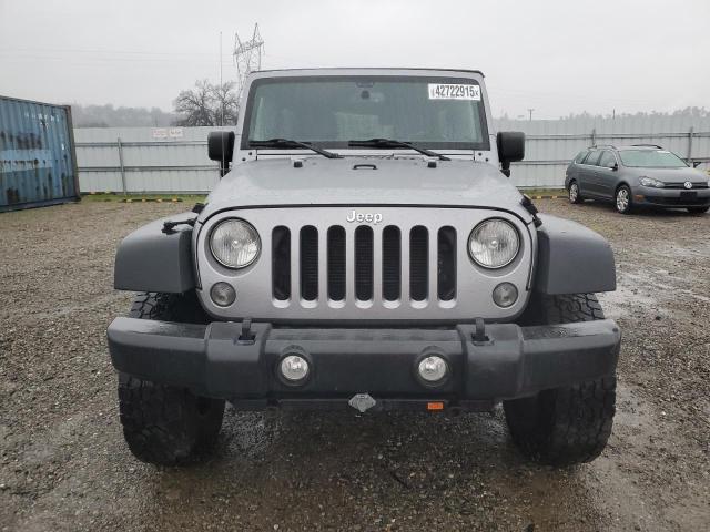 Photo 5 from auction – 2016 JEEP WRANGLER U with VIN 1C4BJWDG3GL110145