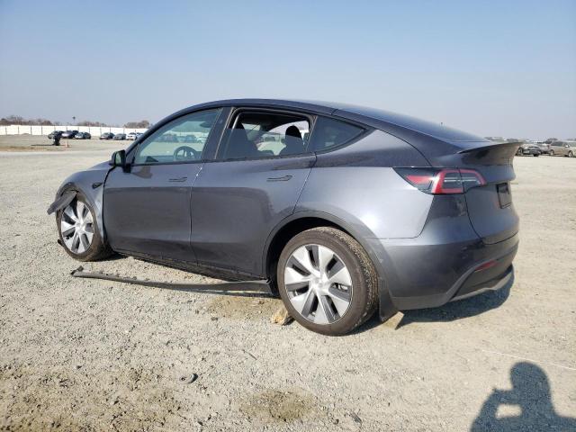 Снимка 2 от търг – 2023 TESLA MODEL Y с VIN 7SAYGDEE2PF929213