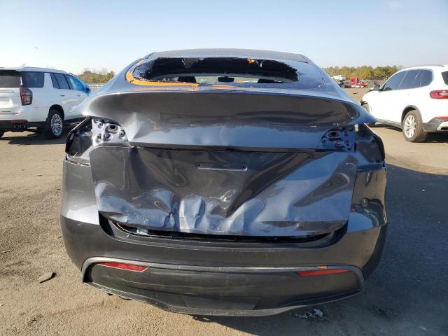 Photo 6 from auction – 2023 TESLA MODEL Y with VIN 7SAYGDED6PF933983
