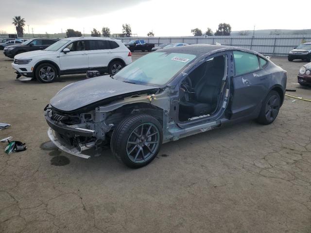 TESLA MODEL 3 2022 with VIN 5YJ3E1EBXNF122002 - Photo from auction