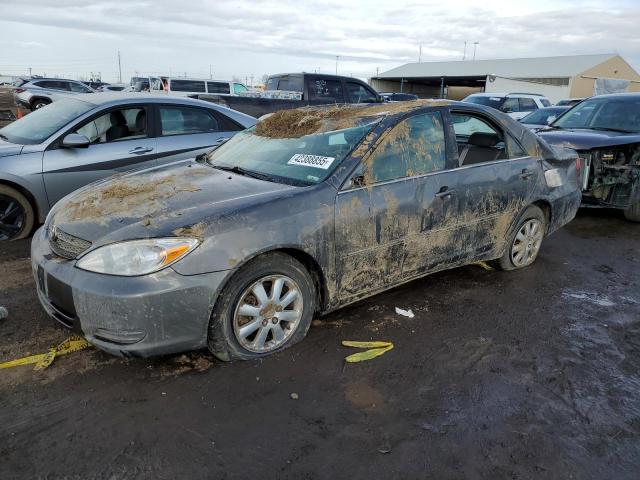 TOYOTA CAMRY LE 2002 with VIN JTDBF30K020035652 - Photo from auction