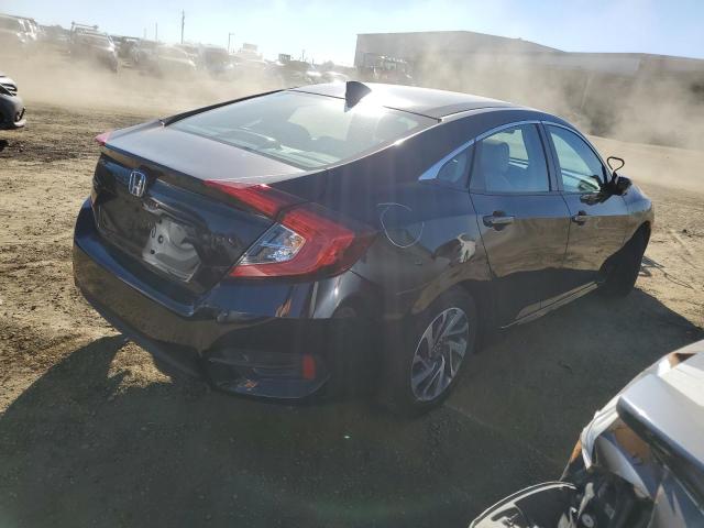 Photo 3 from auction – 2018 HONDA CIVIC EX with VIN 2HGFC2F70JH518335