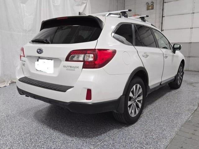 Photo 4 from auction – 2017 SUBARU OUTBACK TO with VIN 4S4BSATCXH3418540