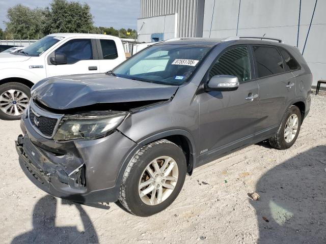 KIA SORENTO LX 2014 with VIN 5XYKTDA69EG483113 - Photo from auction