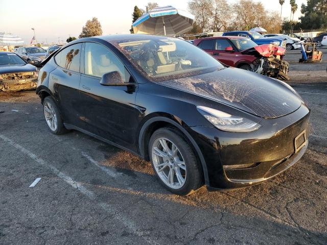 Photo 4 from auction – 2023 TESLA MODEL Y with VIN 7SAYGDEE7PA029050