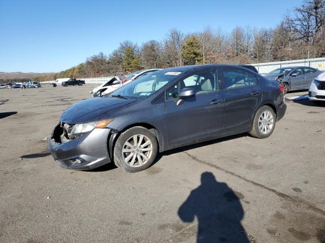 HONDA CIVIC EXL 2012 with VIN 19XFB2F93CE325016 - Photo from auction