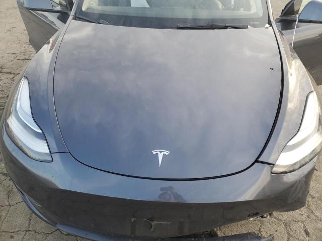 Photo 11 from auction – 2021 TESLA MODEL Y with VIN 5YJYGDEE0MF278706