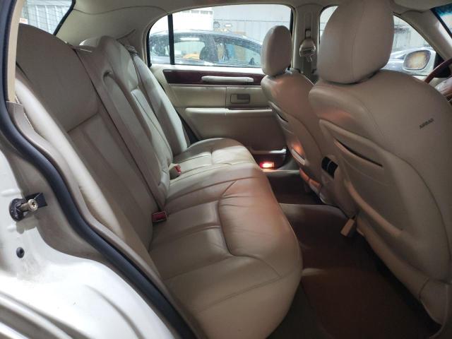 Photo 10 from auction – 2004 LINCOLN TOWN CAR U with VIN 1LNHM83W04Y649628