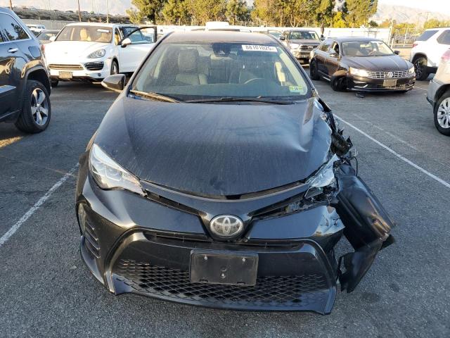 Photo 5 from auction – 2017 TOYOTA COROLLA L with VIN 5YFBURHE2HP737655