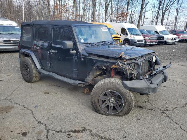 Photo 4 from auction – 2009 JEEP WRANGLER U with VIN 1J8GA59129L731862