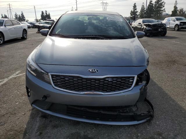 Photo 5 from auction – 2018 KIA FORTE LX with VIN 3KPFL4A77JE191817