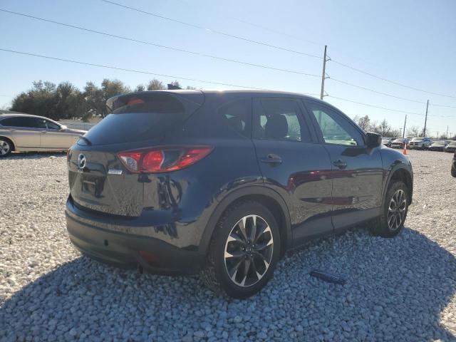 Photo 3 from auction – 2016 MAZDA CX-5 GT with VIN JM3KE2DY0G0669182