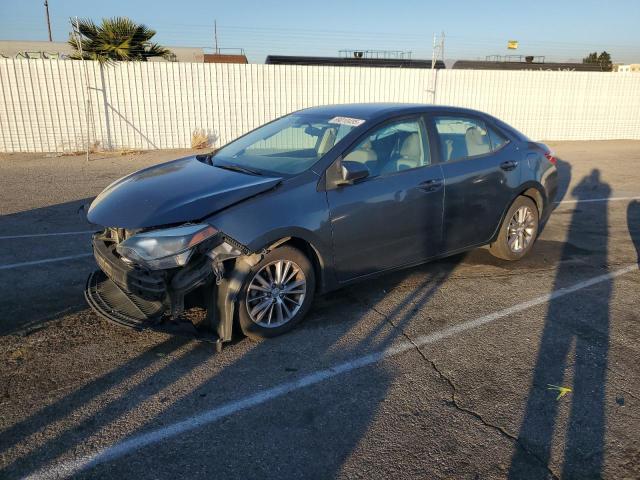 TOYOTA COROLLA L 2014 with VIN 5YFBURHE8EP148430 - Photo from auction